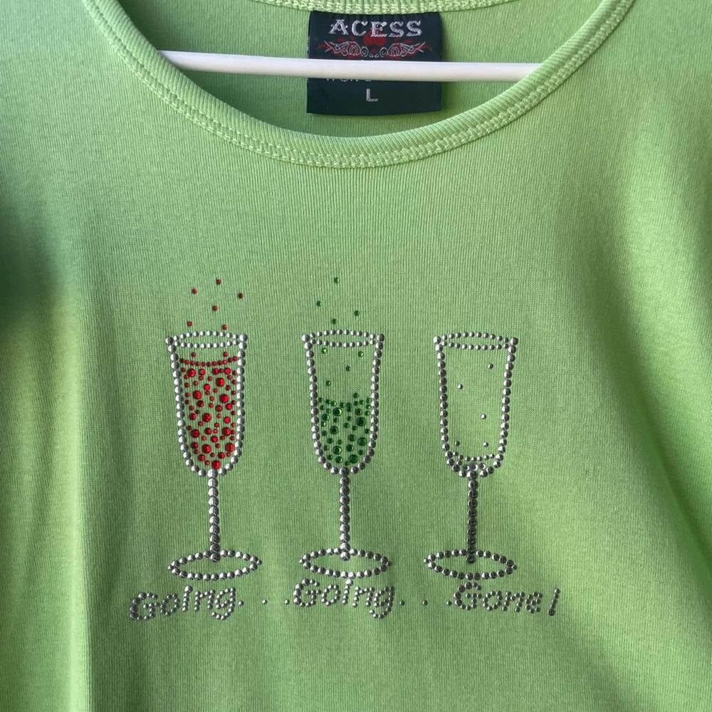 Aces brand size L & XL Rhinestoned T-shirts. Reads: “Going…Going…Gone!”